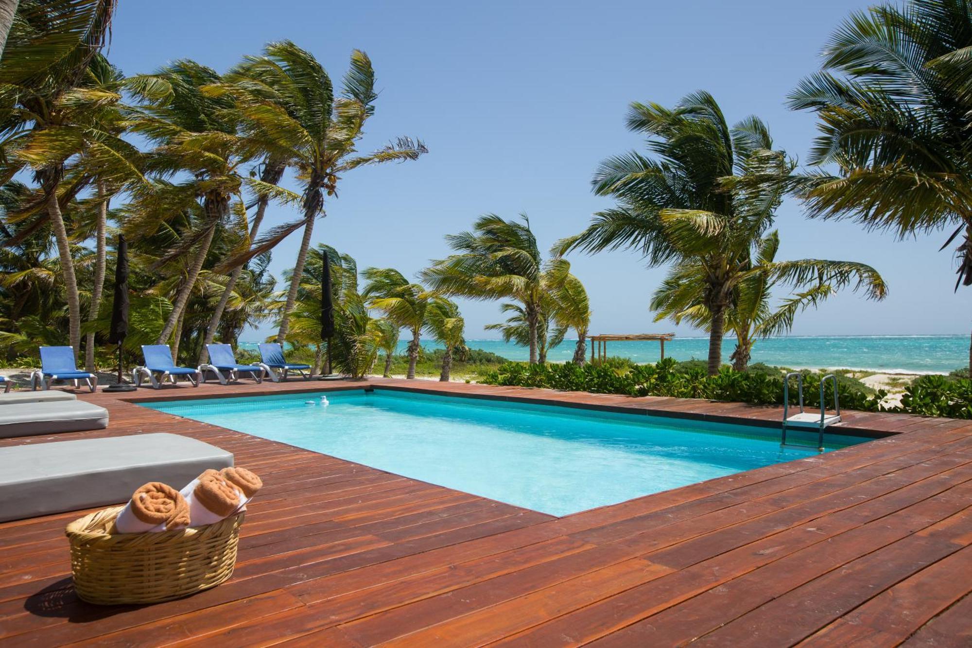 Сasa de vacaciones Beachfront Private Sian Kaan
