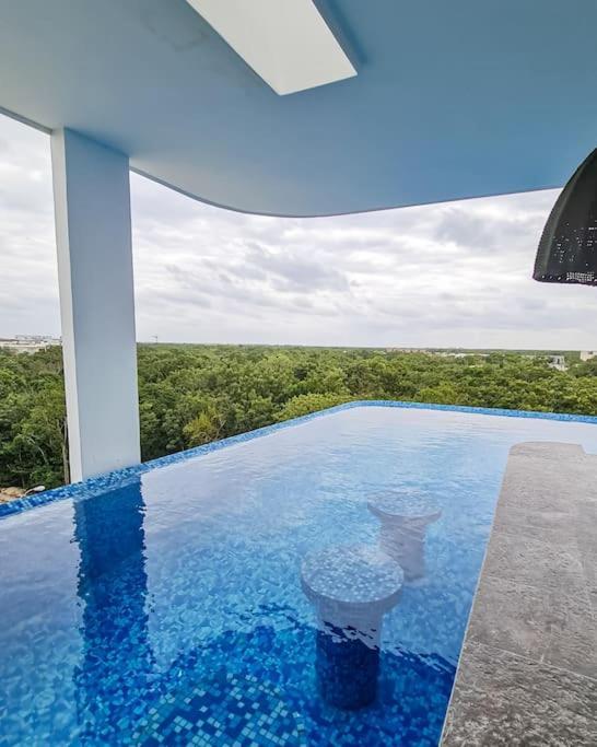 Elle 107 Tropical Aldea Zama